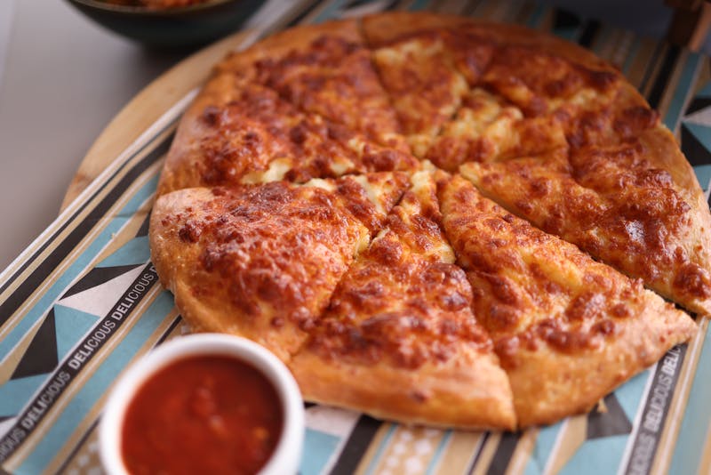Garlic knots with marinara dipping sauce